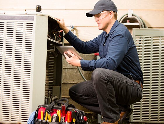 technician-checking-tablet-air-conditioning-system-maintenance